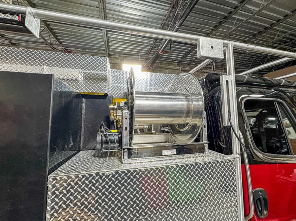 Engine and hose connection hardware detail, photo 69 of 303.